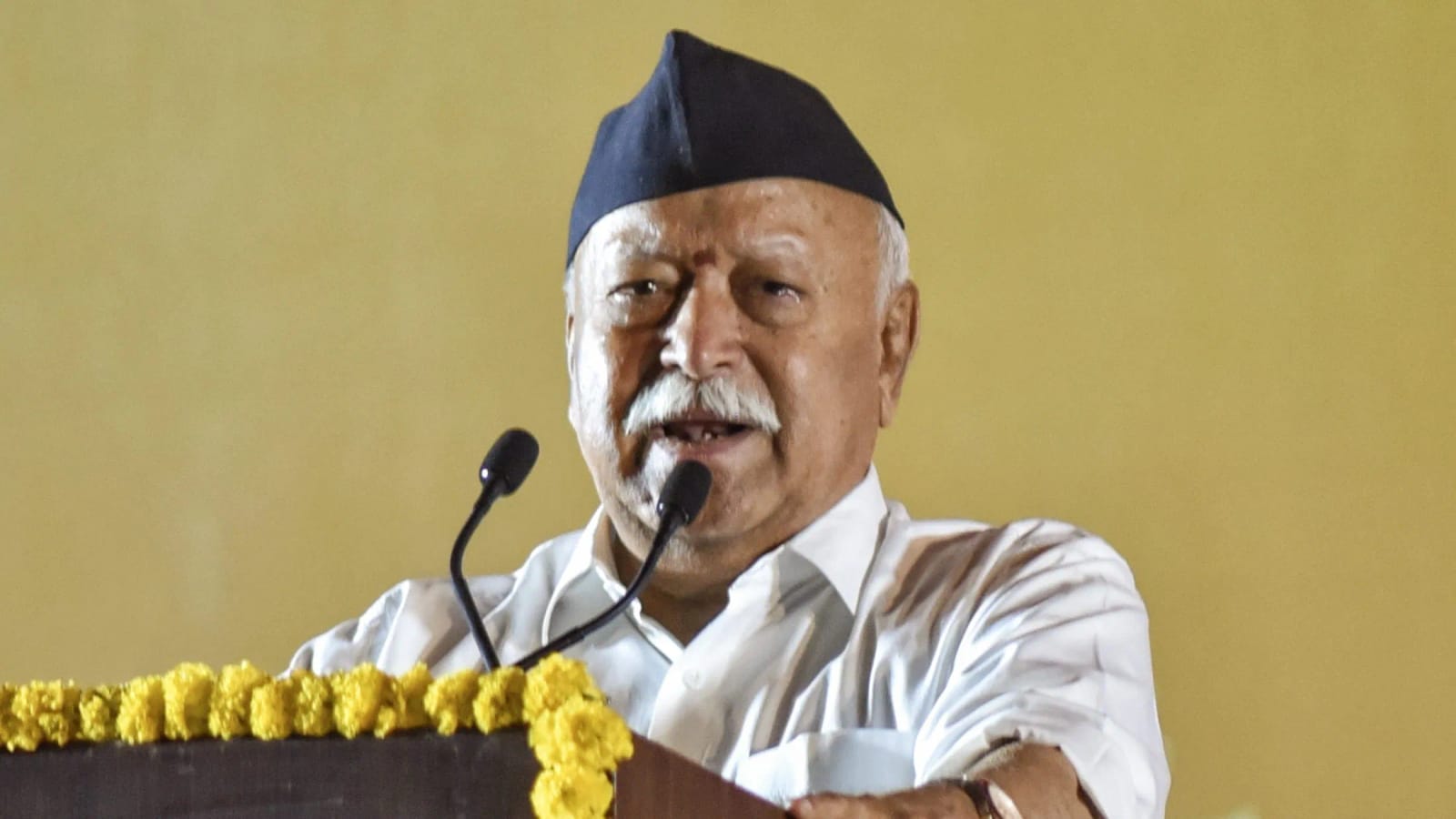 RSS Chief Mohan Bhagwat speaking at an event, news.