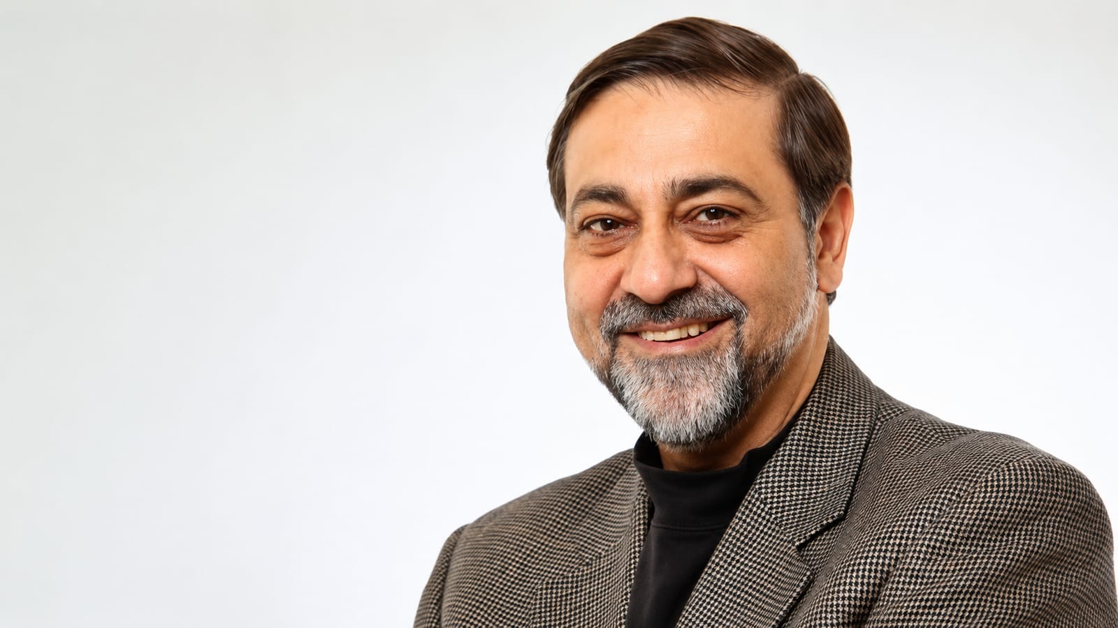 Portrait of Indian tech leader Vikram Wadhwa discussing visa and immigration