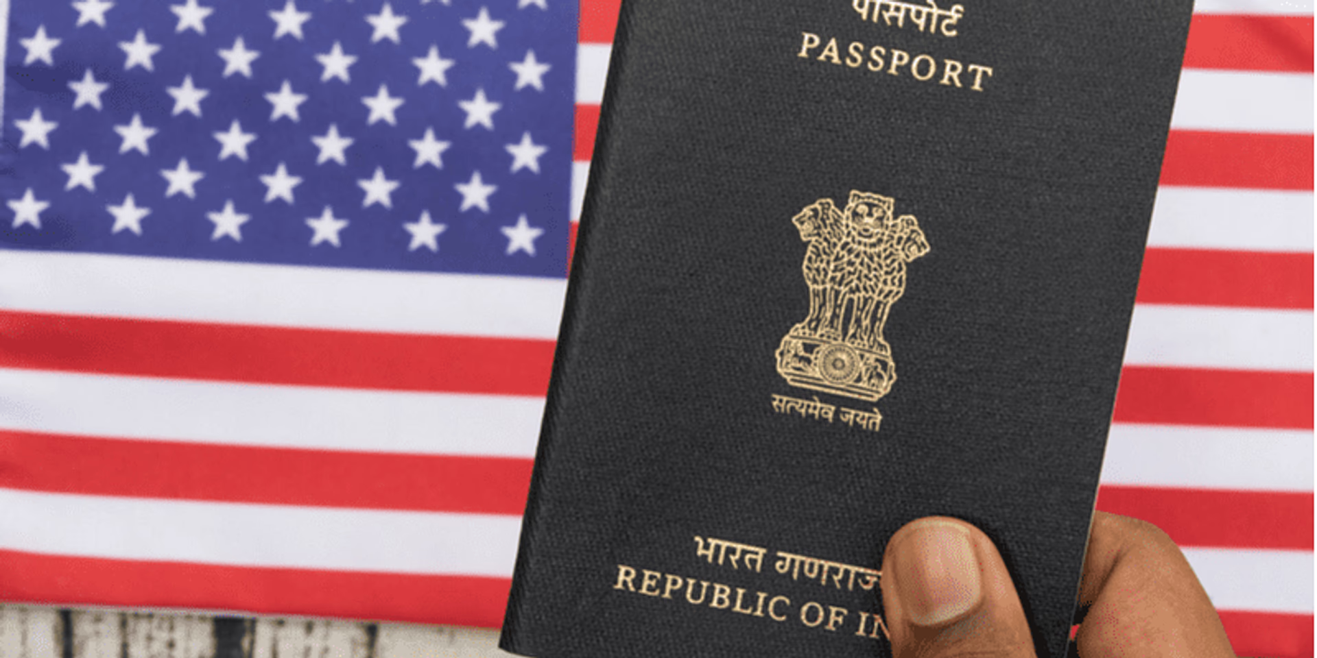Indian passport held in front of US flag, related to H-1B visa and immigration.