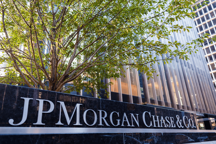JP Morgan Chase & Co. building exterior with tree, reflecting company's record profit.