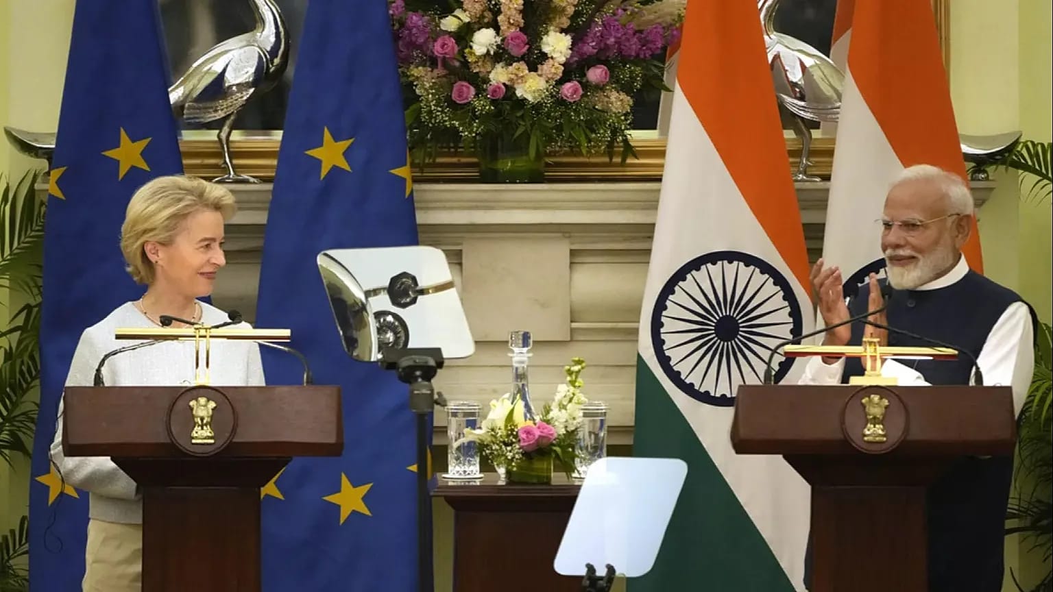 PM Modi and Ursula von der Leyen at EU-India summit, discussing business.