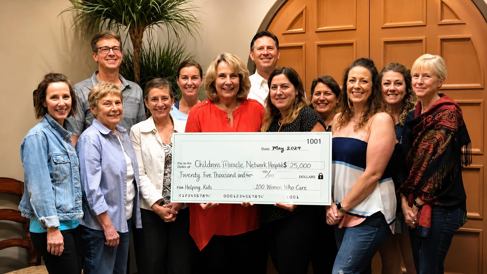 100 Women Who Care donate $25,000 to Children's Miracle Network Hospitals.