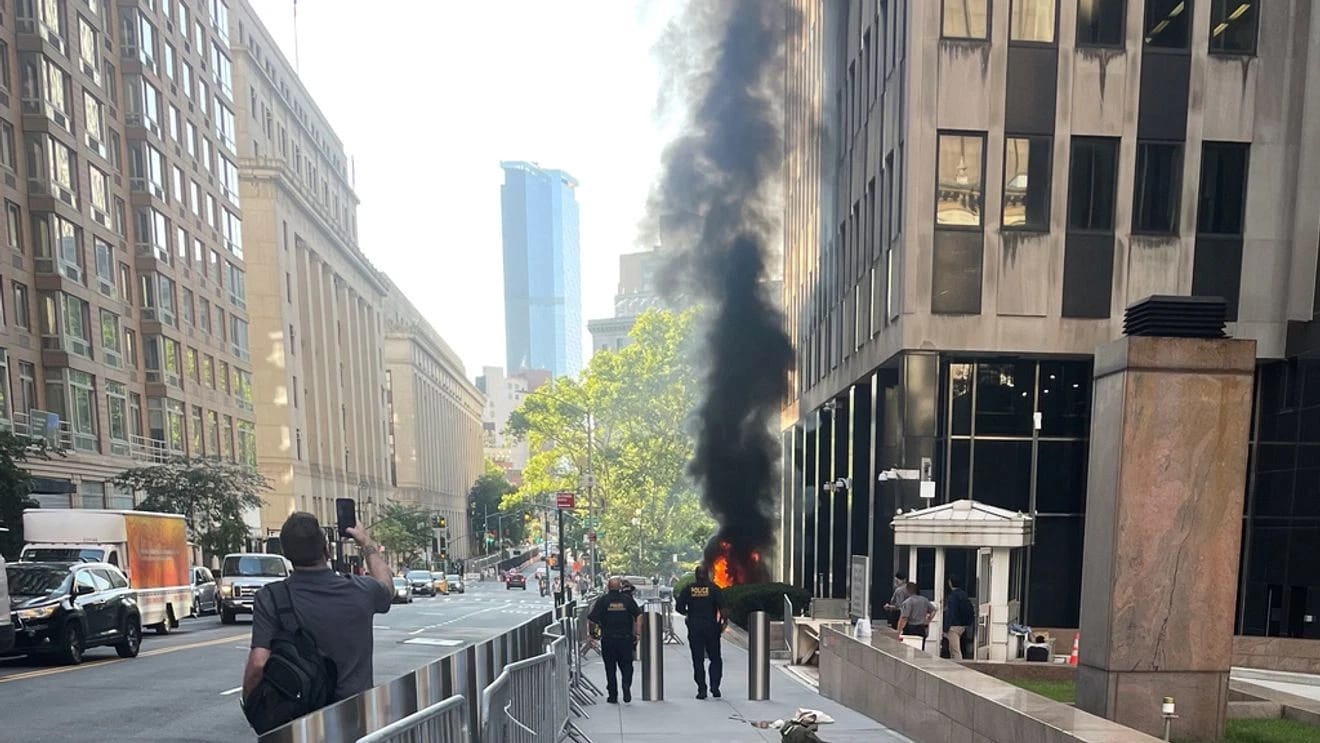 NYC federal building fire after incendiary device blast, suspect arrested; politics