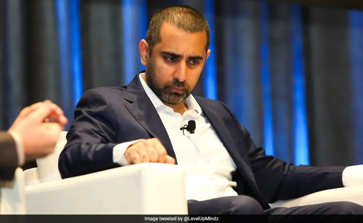 Indian-American CEO in a business suit