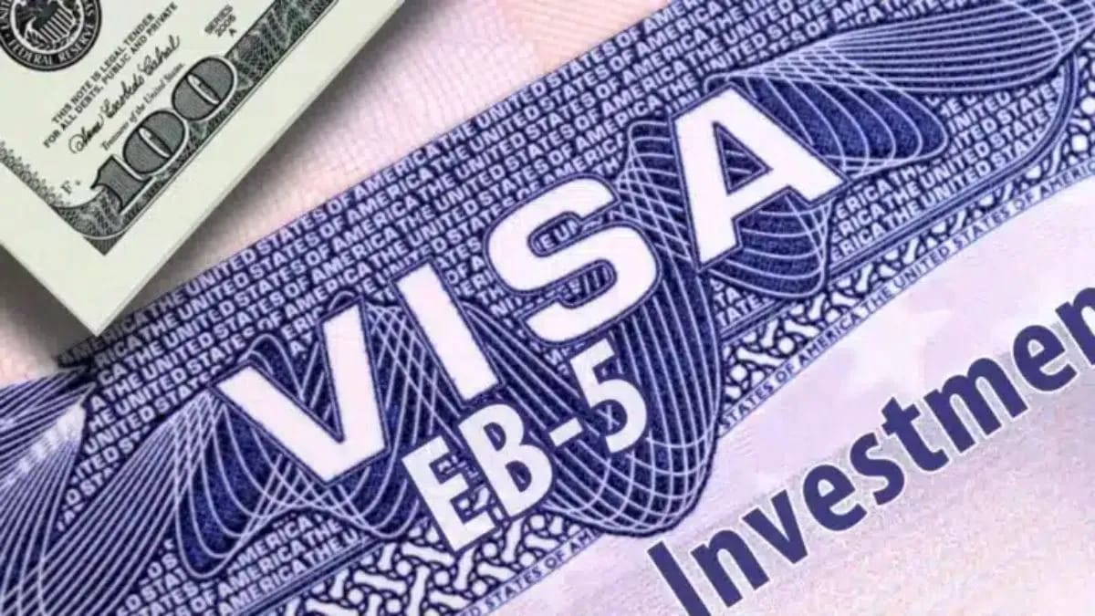 EB-5 visa document with US dollar bills, symbolizing investment immigration from India.