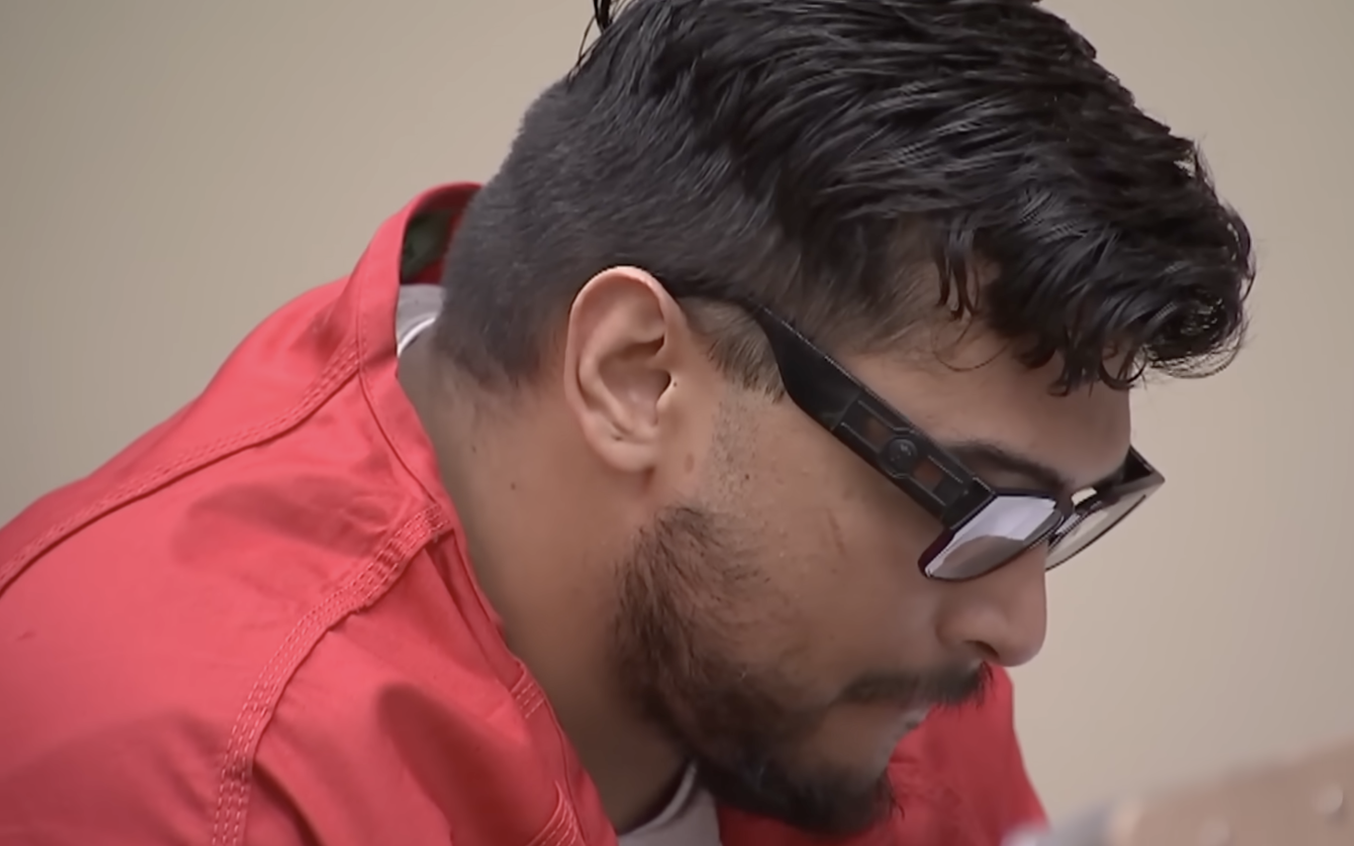 Man in red shirt and glasses, California newborn murder case