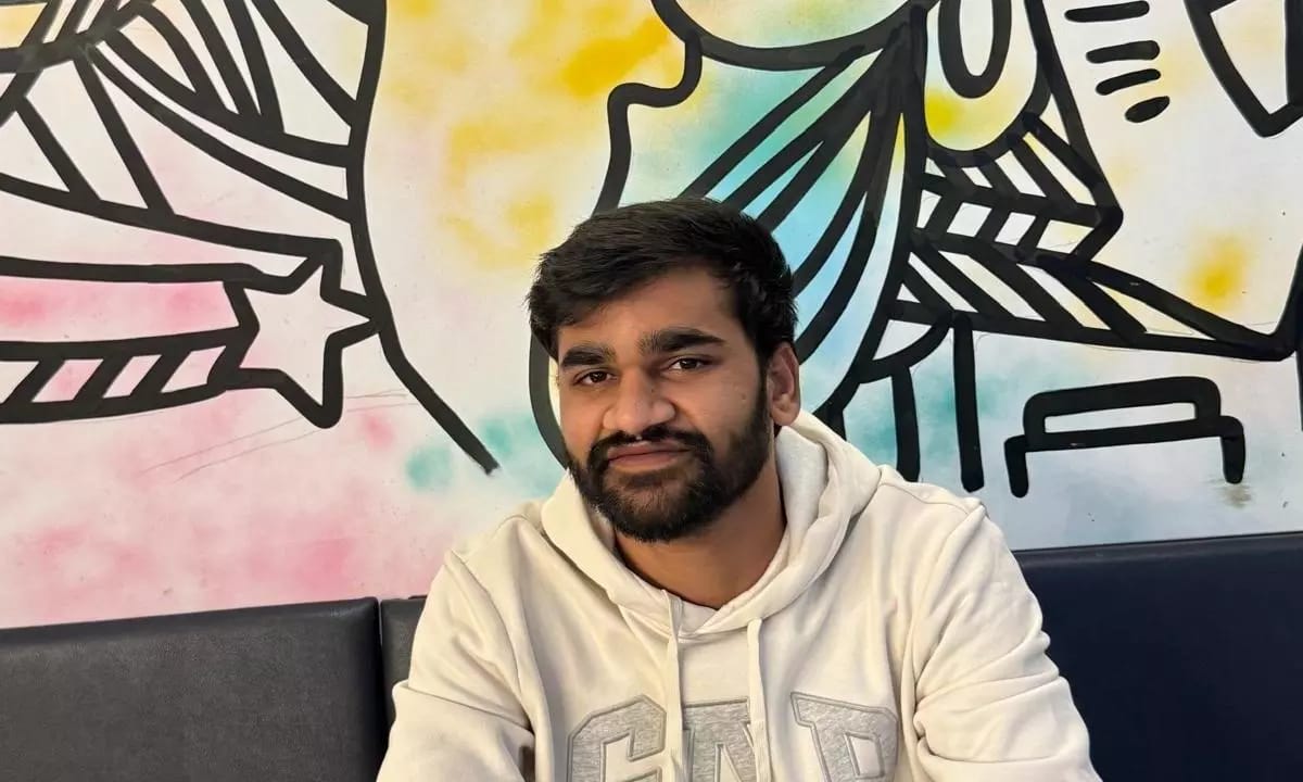 Indian man in hoodie, context: article on politics and fatal accident
