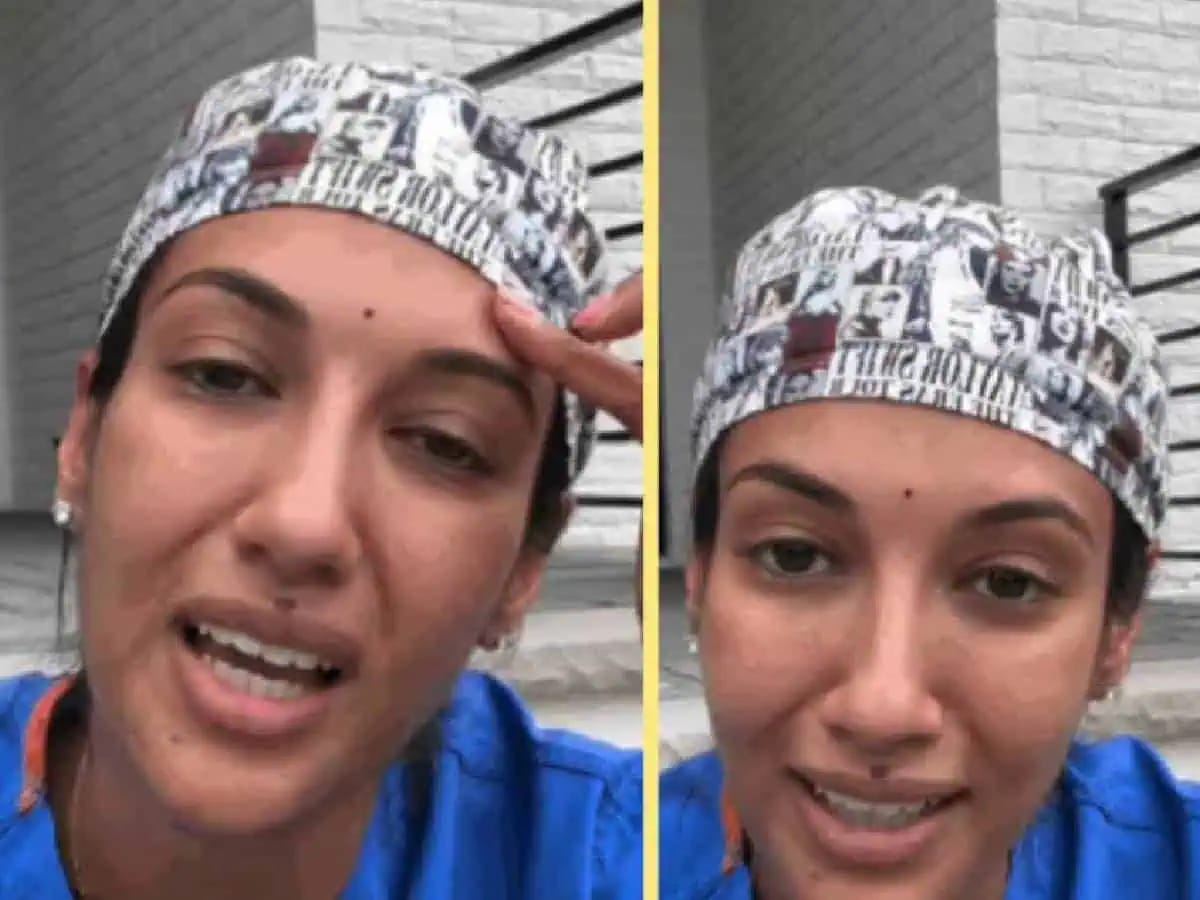 Indian-American doctor wearing a bindi and surgical cap, racially harassed.